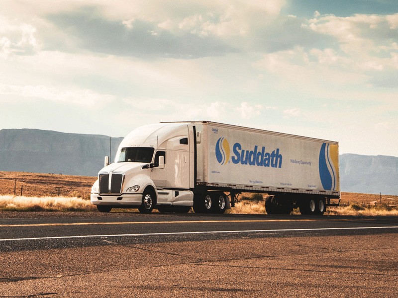 suddath moving truck transporting logistics freight on highway