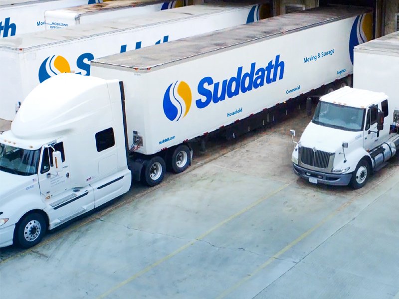 suddath trucks parked at loading docks