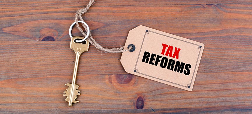 key attached to tax reform tag